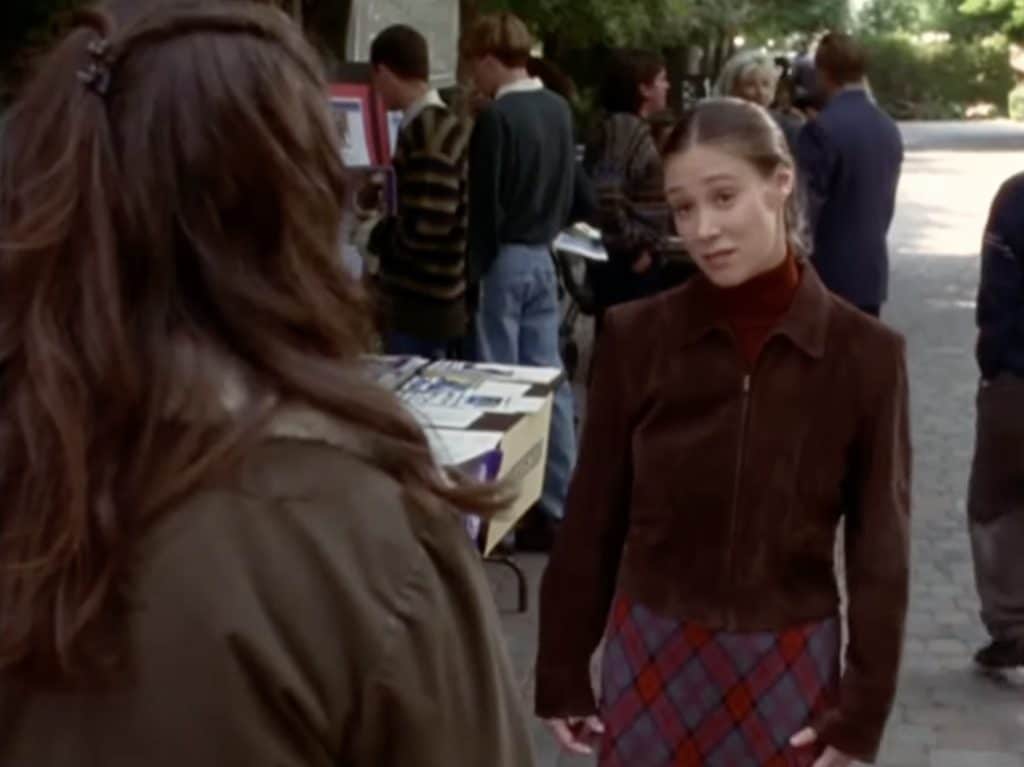Paris geller pictured in a conservative monochromatic burgundy outfit
